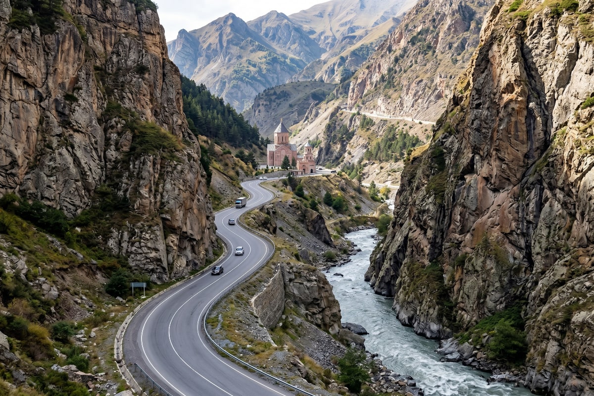 Winding road through the dramatic walls of Dariali Gorge