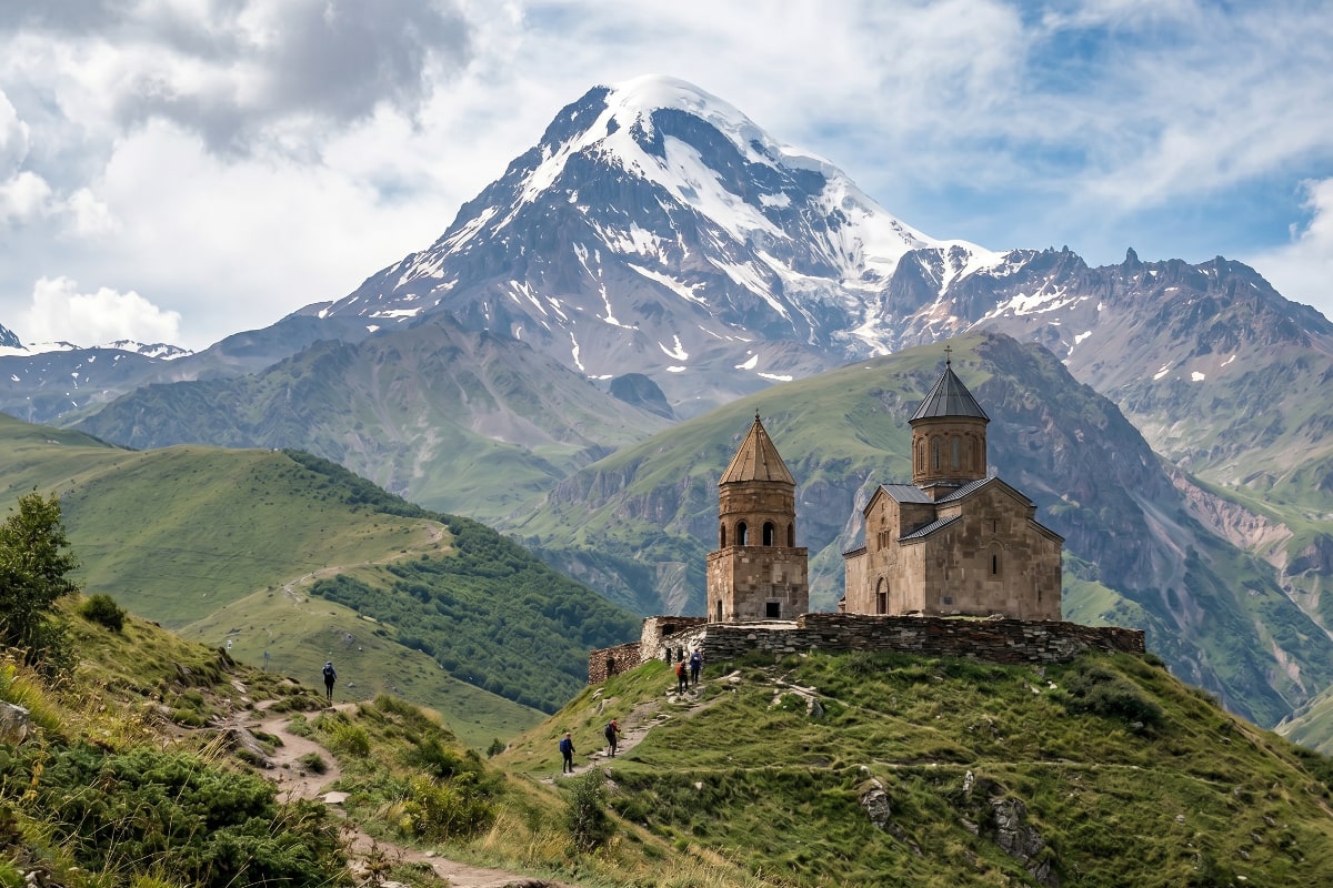 Gergeti Trinity Church silhouetted against Mount Kazbek